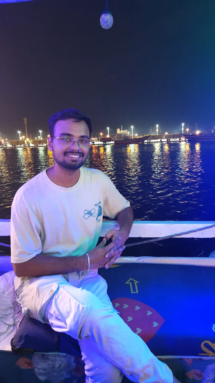 Amresh on a boat in the evening